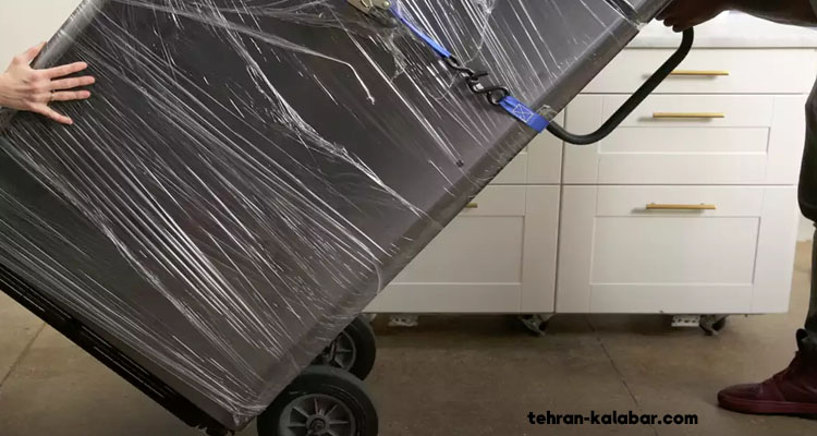 حمل یخچال ساید از راه پله با چرخ دستی